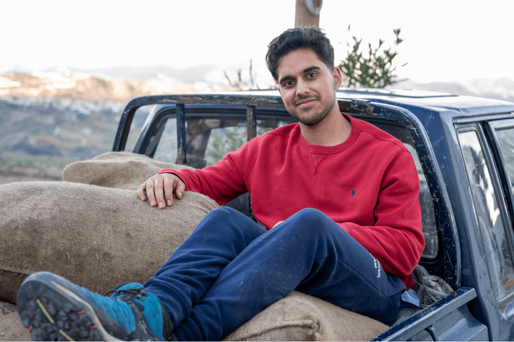 Image of Co founder in the trunk with olives